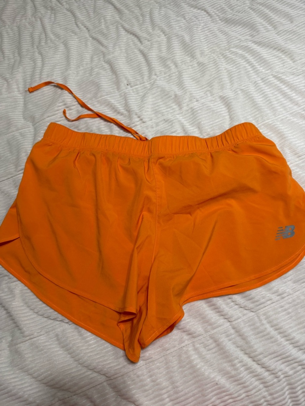 New Balance Women's Bright Orange Athletic Shorts